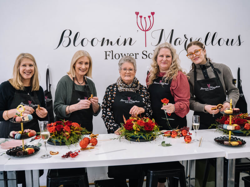 A group of women at a Christmas floristry class